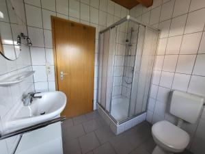 Ένα μπάνιο στο Ferienhaus Bella