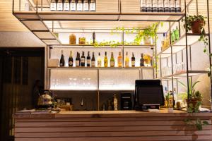 a bar with a lot of bottles of wine at Yeruu lodge in Jargalant