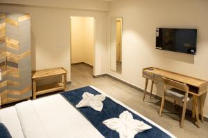 Postelja oz. postelje v sobi nastanitve Palm Regal Resort
