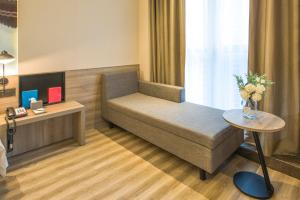 Letto o letti in una camera di Atour Hotel Foshan Nanhai Qiandeng Lake Guicheng