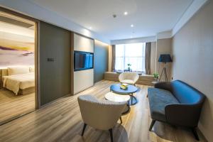 TV o dispositivi per l'intrattenimento presso Atour Hotel Foshan Nanhai Qiandeng Lake Guicheng