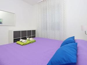 Posteľ alebo postele v izbe v ubytovaní Lovely apartment in Krk + 31 fotografií