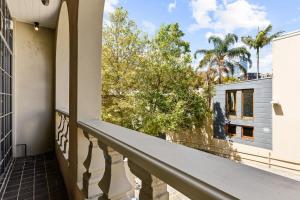 a balcony with a view of a building at Luxury Space in Victorian Mansion with Hot Tub in Sydney