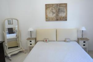 Postel nebo postele na pokoji v ubytování Aquarius Inn