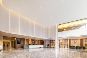 a view of the lobby of a hotel at Atour X Hotel Wuxi Sanyang Plaza Zhongshan Road in Wuxi