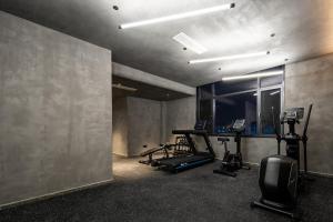 a gym with several exercise bikes and a window at Atour Light Hotel Chengdu Shuangliu Airport Jinhua Road in Chengdu