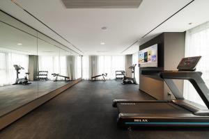 a gym with several treadmills and a treadmill at Atour Hotel Chengdu Xibo City Shuzhou Road in Chengdu