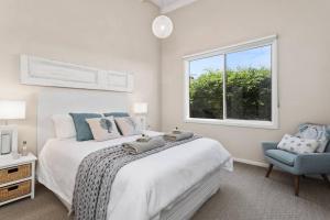 BELLE VUE BEACH HOUSE客房内的一张或多张床位