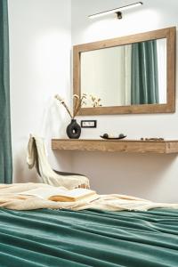A bed or beds in a room at Stathis Studios II