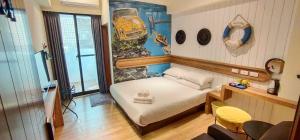 Postel nebo postele na pokoji v ubytování Go Home Homestay