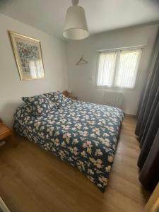 Posteľ alebo postele v izbe v ubytovaní Cosy Giverny