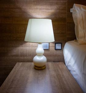 Postel nebo postele na pokoji v ubytování Prosbel Hotel