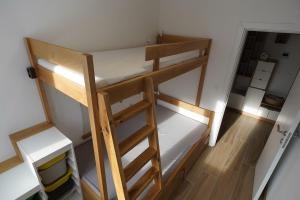 an overhead view of a bunk bed in a room at Ravna Planina in Pale