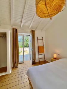 Katil atau katil-katil dalam bilik di Casa Vermelha