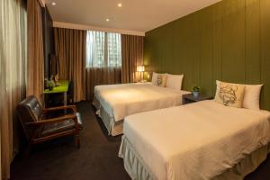 Finders Hotel-Fu Qian客房内的一张或多张床位
