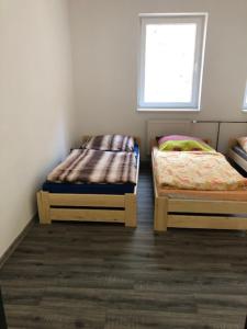 Postel nebo postele na pokoji v ubytování UBYTOVNA SK Posázavan Poříčí nad Sázavou