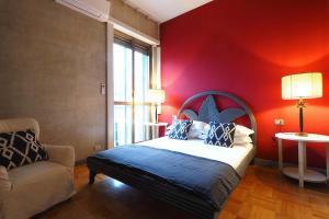 Voodi või voodid majutusasutuse HomNest I S.Ambrogio Elegant Apt toas
