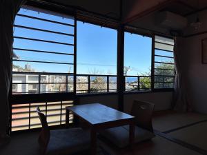 Un balcón o terraza en Atami Ikyuan 熱海一休庵