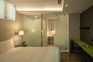 Finders Hotel-Fu Qian客房内的一张或多张床位