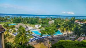 an aerial view of the resort and the ocean at Harmony Homes Beachfront in Diani Beach