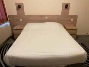 Letto o letti in una camera di Hotel Bristol Internationaal