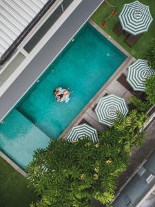 Bazén v ubytování Monolocale Luxury Resort & Spa Seminyak by Ini Vie Hospitality nebo v jeho okolí