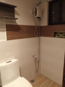 Ванна кімната в Amos Pili Tree Inn powered by Cocotel