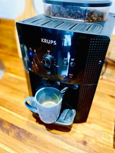 Coffee and tea making facilities at Le Duplex Rouen Cocooning Rouen Centre Parking Még 1 kép