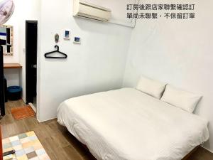 Postelja oz. postelje v sobi nastanitve Nanwan254 Homestay