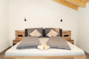 Postel nebo postele na pokoji v ubytování Kaunergrat Appartement