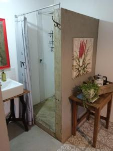 a bathroom with a shower and a sink at Stay @ Dudok in Oudtshoorn