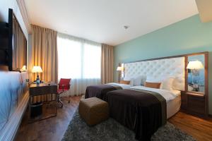 Postel nebo postele na pokoji v ubytování Clarion Hotel Arlanda Airport Terminal