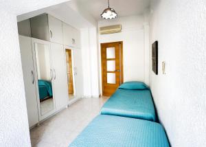 Posteľ alebo postele v izbe v ubytovaní Skol 439 Spacious and Refurbished Apartment with Sea Views