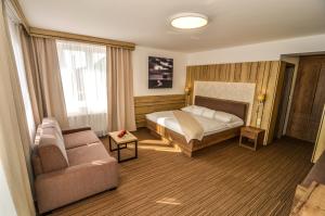 Posteľ alebo postele v izbe v ubytovaní Villa Betula Resort & Camping + 37 fotografií