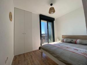 Katil atau katil-katil dalam bilik di La Suite Griffon - Parking & Balcon