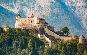 a large castle on top of a mountain at Hallerhaus in Altenmarkt im Pongau