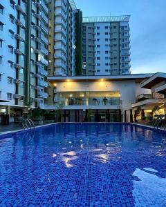 Πισίνα στο ή κοντά στο Staycation with Ocean View+Near Malls+Free Pool+Wifi+Netflix