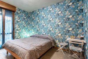 A bed or beds in a room at Residenza Il Fiore