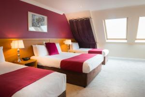 Voodi või voodid majutusasutuse Hotel Ceann Sibeal toas