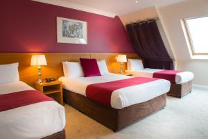 Voodi või voodid majutusasutuse Hotel Ceann Sibeal toas
