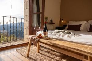 Postel nebo postele na pokoji v ubytování Hotel Siuranella