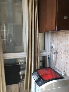 Cucina o angolo cottura di Yailon House - TieXinQiao Metro St-ation - NanJing South Railway St-ation - 雅伦之屋-铁心桥地铁站-火车南站店
