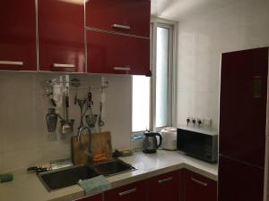 Cucina o angolo cottura di Yailon House - TieXinQiao Metro St-ation - NanJing South Railway St-ation - 雅伦之屋-铁心桥地铁站-火车南站店