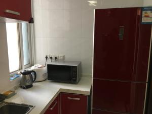 Cucina o angolo cottura di Yailon House - TieXinQiao Metro St-ation - NanJing South Railway St-ation - 雅伦之屋-铁心桥地铁站-火车南站店