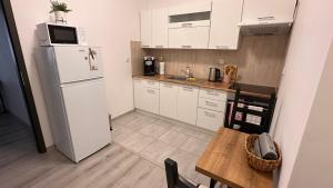 Dapur atau dapur kecil di Apartmány na Trojce