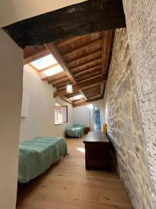 Postel nebo postele na pokoji v ubytování Agriturismo Alba di Cortona - Appartamento Lavanda-Appartamento Rosmarino