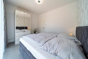 Postel nebo postele na pokoji v ubytování Appartement 2 - Dünenblick