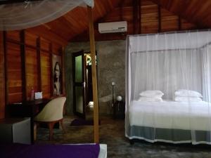Postel nebo postele na pokoji v ubytování Turtle Eco Beach + 37 fotografií