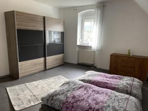 Postel nebo postele na pokoji v ubytování Ferienwohnung Rosch