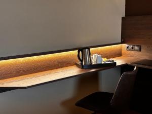 Příslušenství pro přípravu čaje a kávy v ubytování Hotel Melba